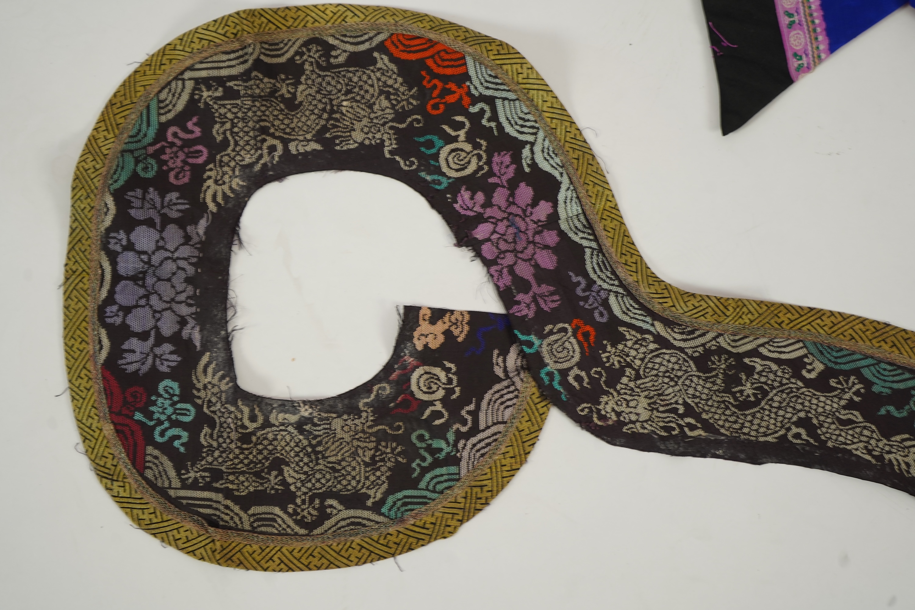 Two Chinese embroidered silk wedding skirts, late Qing, five hats, trousers, two skirt panels and two others, collar and a panel